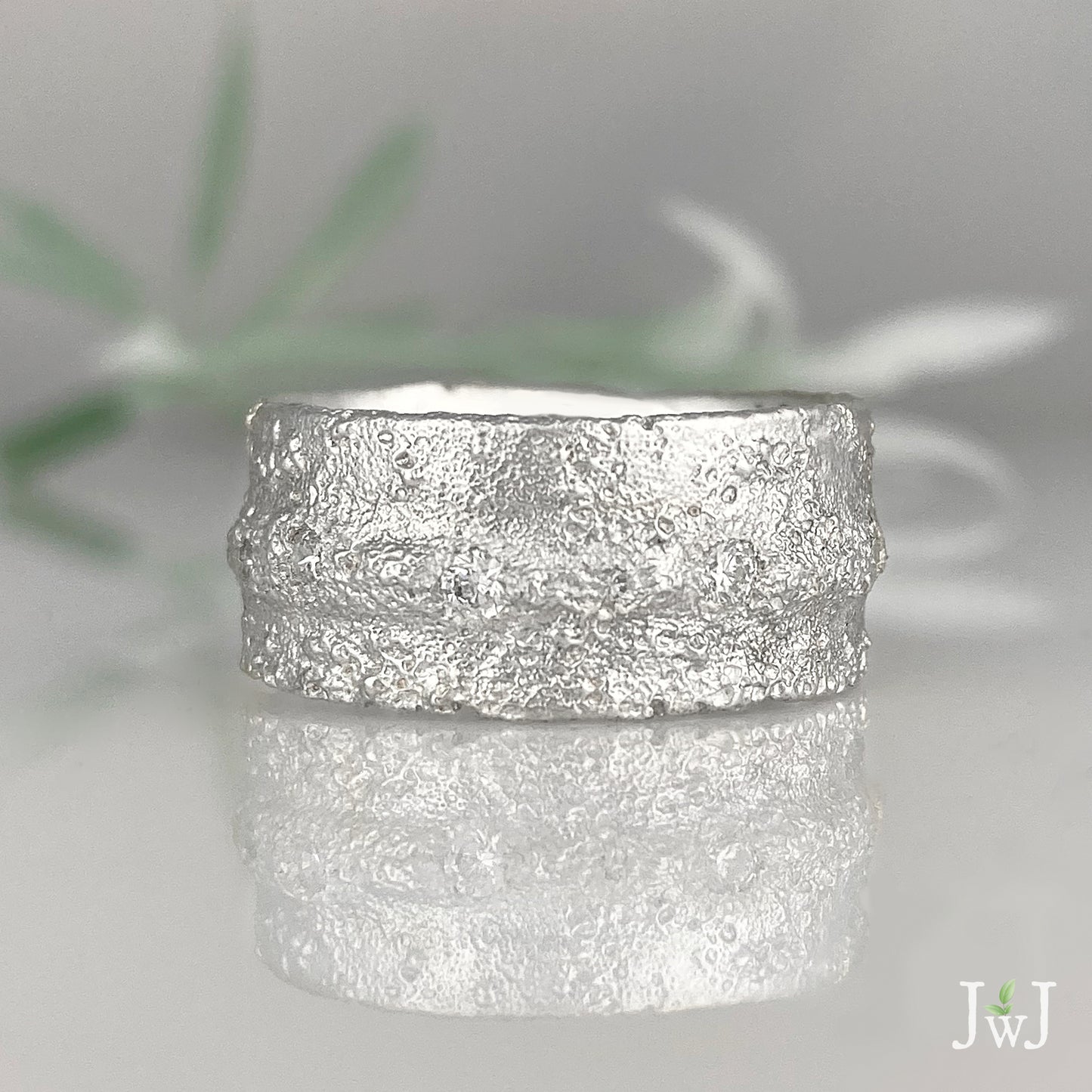 Wide white gold sand textured wedding band