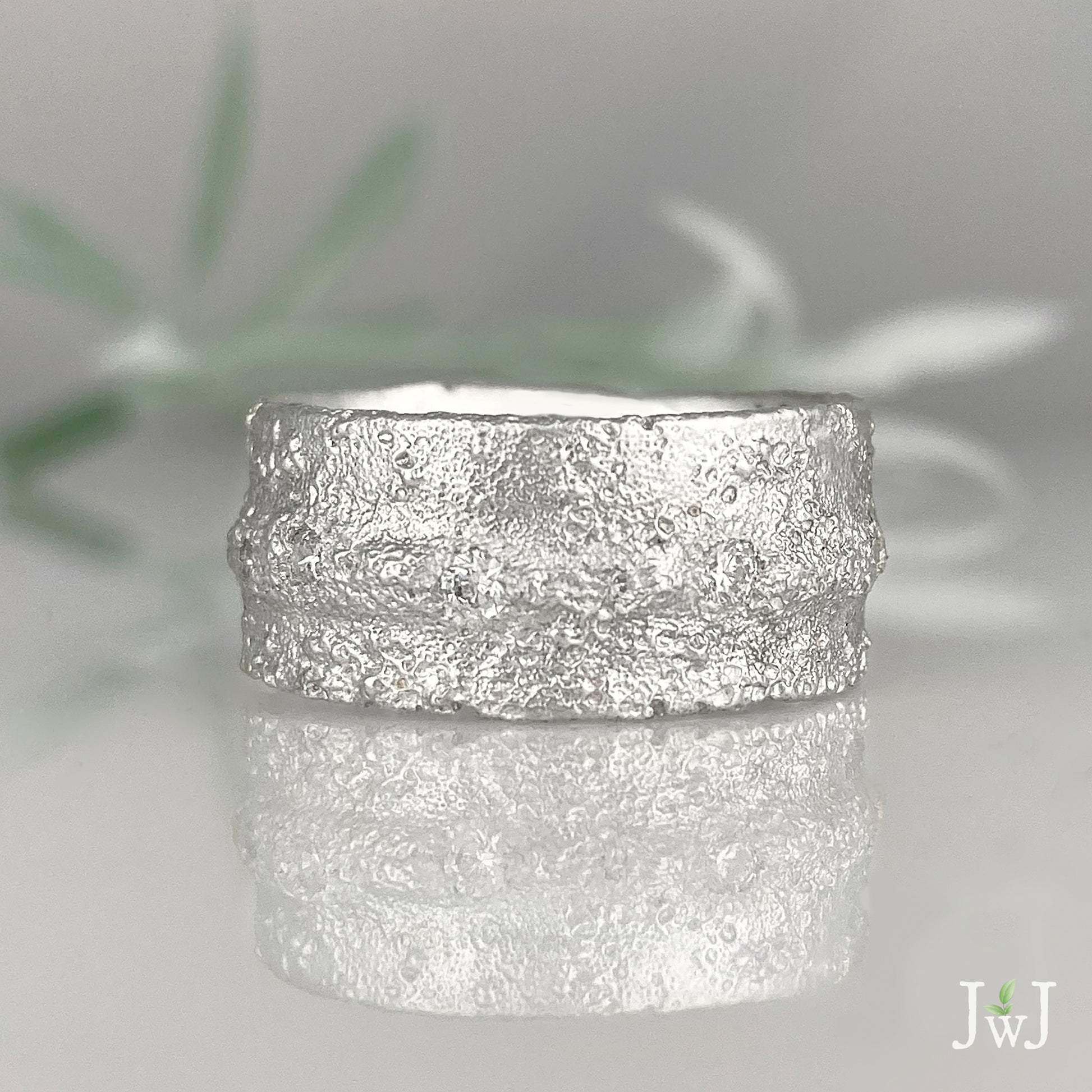 Wide white gold sand textured wedding band